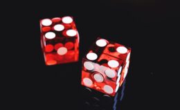 two red-and-white dices