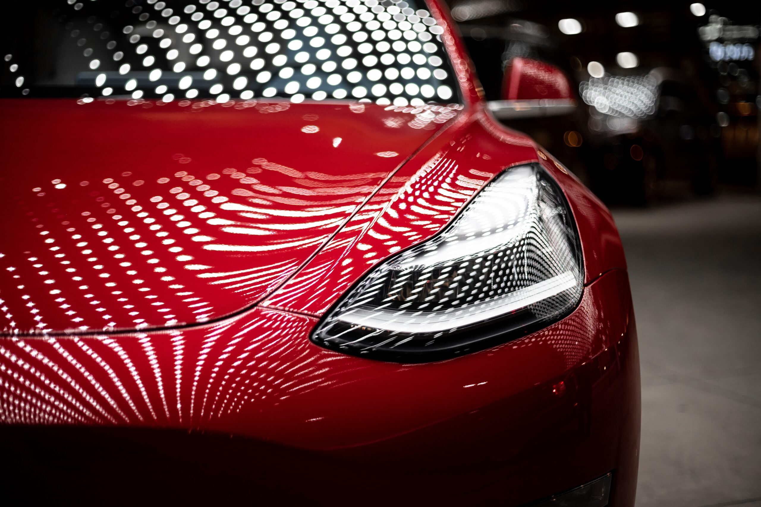 close-up photography of red car