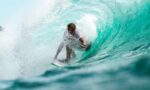 time lapse photography surfer in wave water