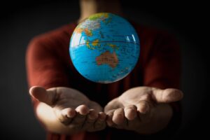 Globe floating above the hand