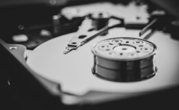 white and black turntable in grayscale photography