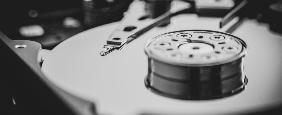 white and black turntable in grayscale photography