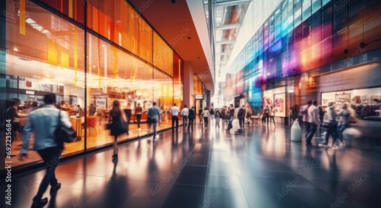 Busy Shopping Mall with Colorful Glass Facade