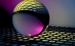 blue and black ball on blue and white checkered textile