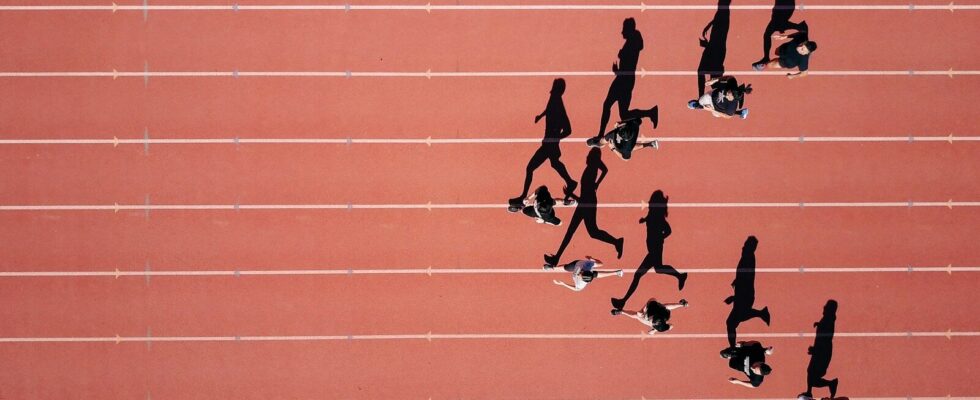 group of people running on stadium